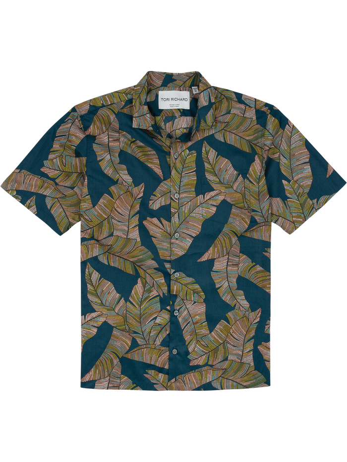 Dark blue short-sleeve button-up with green and brown tropical leaf print, front view.