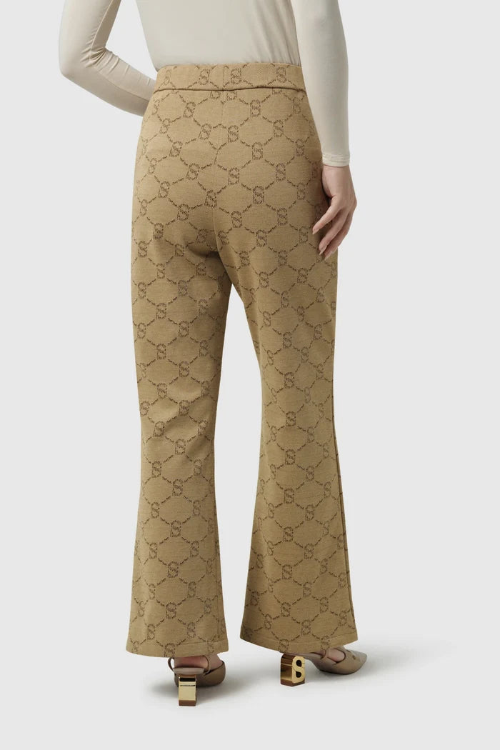 beverly monogram bootcut pants in brown by buttonscarves back view