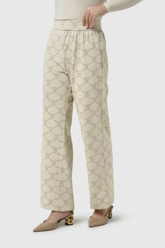beverly monogram pants in cream by buttonscarves front view