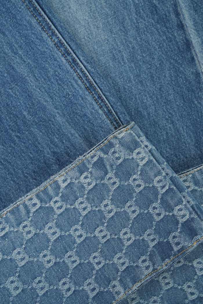 beverly wide leg denim pants in light blue by buttonscarves monogram pattern cuffed hem detail