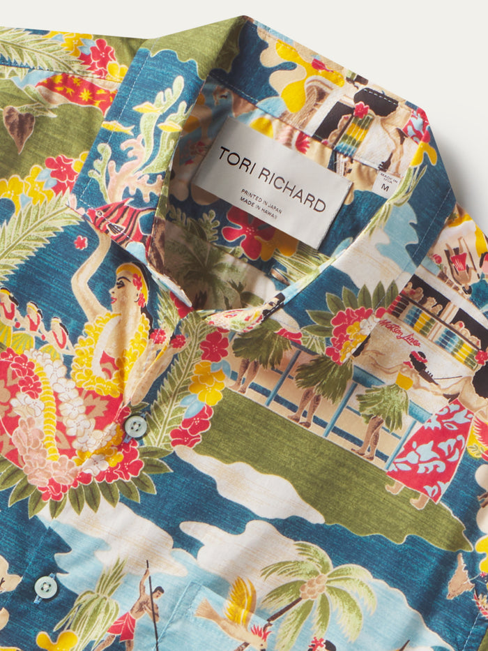 White cotton Hawaiian shirt with colorful tropical print, buttons, and visible collar label, front view (Images 1 & 2).