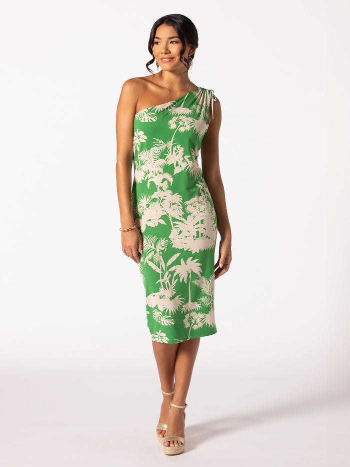 Green botanical-print Keilani one-shoulder dress, front view on model with beige heels.