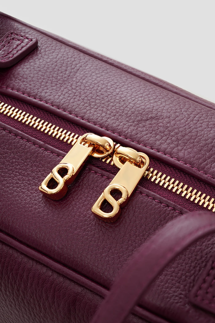 bria shoulder bag in burgundy by buttonscarves secure top zipper detail