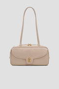 bria shoulder bag in clay by buttonscarves front view