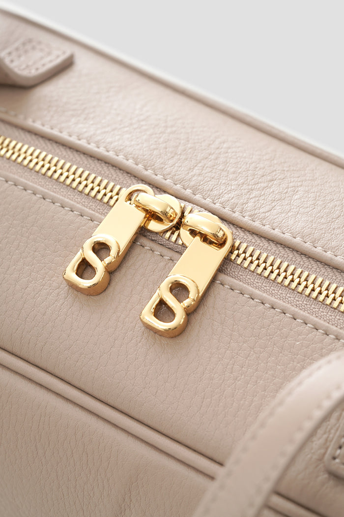 bria shoulder bag in clay by buttonscarves secure top zipper detail