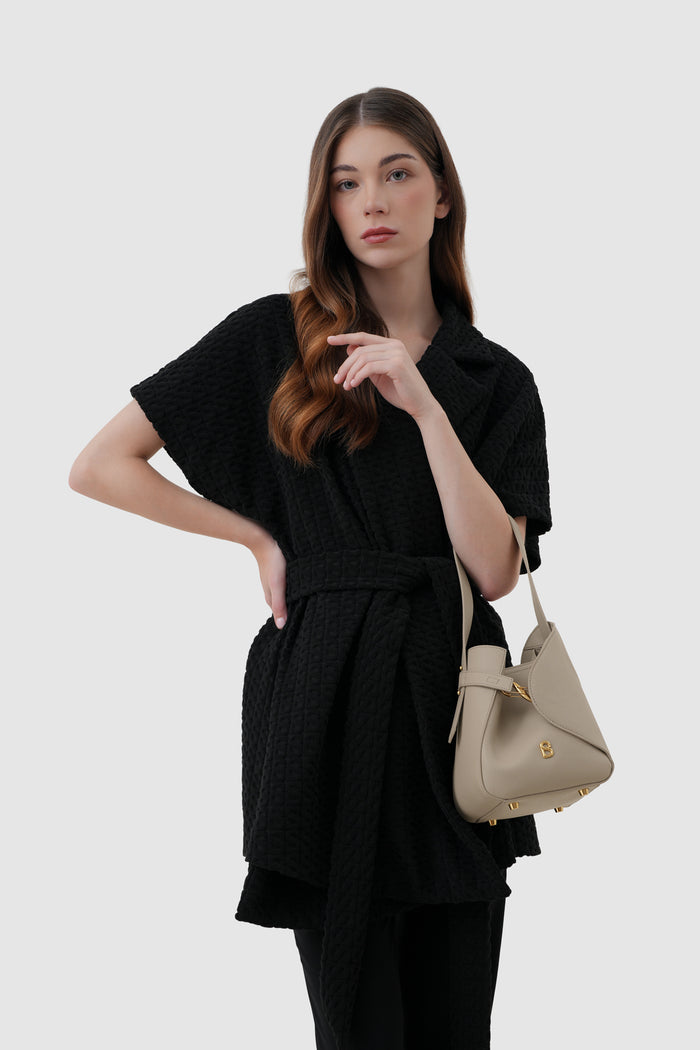 britney bag small with saffiano leather in creta by buttonscarves carried on wrist