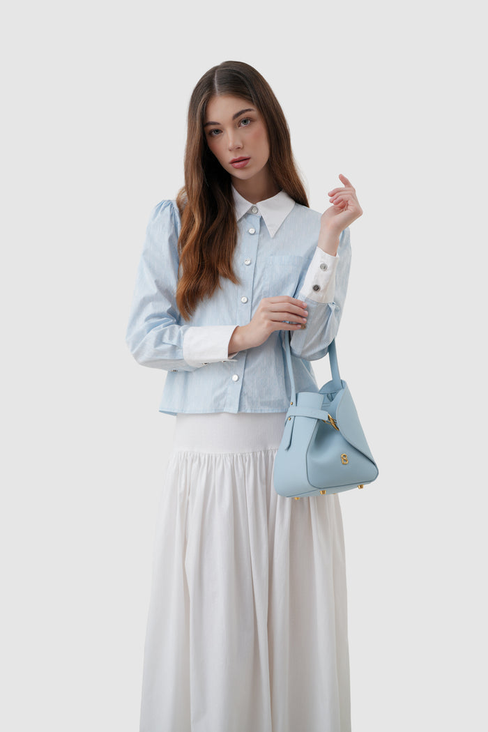 britney bag small with saffiano leather in waterfall by buttonscarves carried on wrist
