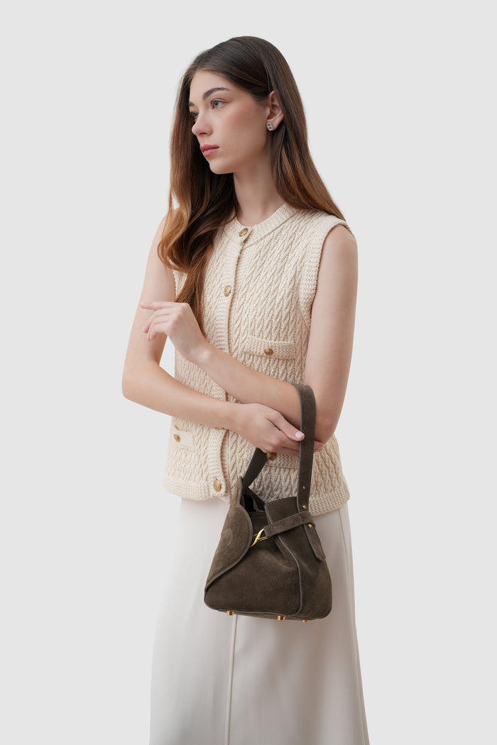 britney bag with suede leather in dark brown by buttonscarves carried on wrist