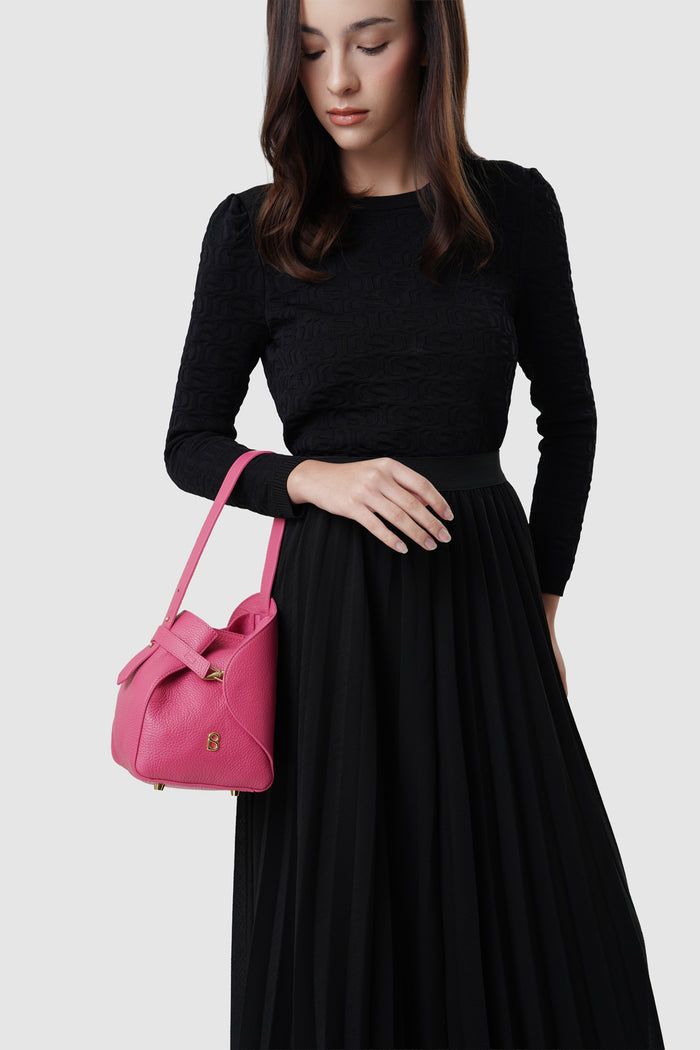 britney bag small in viva magenta by buttonscarves carried on wrist