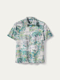 Green and blue tropical palm-print short-sleeve cotton shirt, front and detail views.