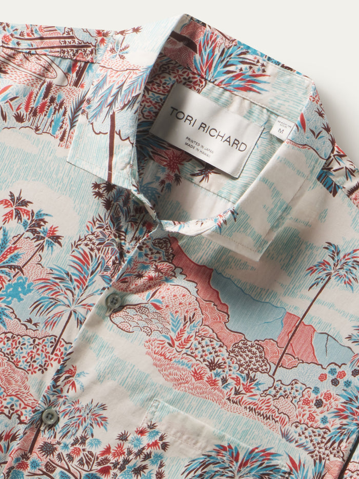 Blue palm tree-print cotton lawn shirt; close-up of Tori Richard label and fabric texture.