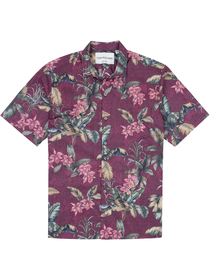 Maroon and white short-sleeve shirt with pink floral print and green leaves, front view.