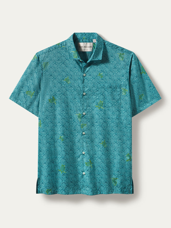 Teal green cotton lawn shirt with chelonian-patterned print, shown from front with subtle patterns.