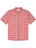 Red and white geometric pattern, short-sleeve shirt, front view, with moisture-wicking fabric detail.