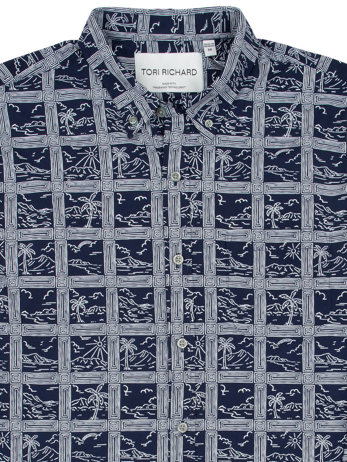 Blue long-sleeve shirt with white tropical line print, front view.