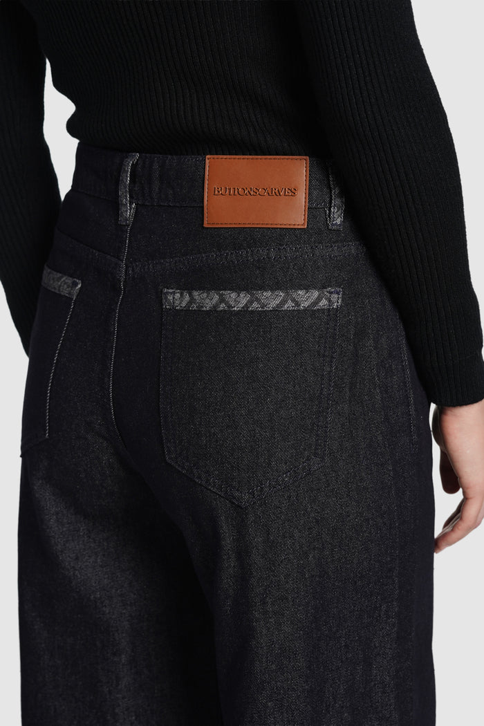 claire denim pants in black by buttonscarves signature silver detail at the back detail