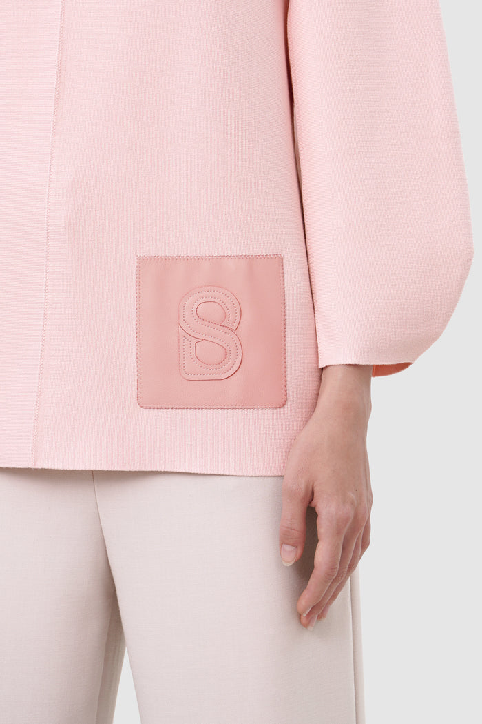 clea sweatshrt in blush by buttonscarves leather b logo patch detail