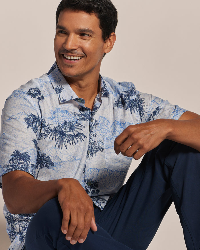 Blue and white Coastal Engraving-print short-sleeve shirt, front view seated (shown in Images 1 and 2).