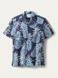 Navy blue pineapple-print short-sleeve button-up shirt, front view.