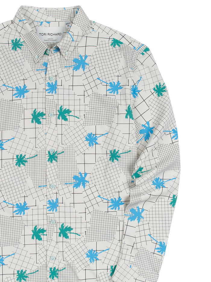 White long-sleeve shirt with blue/green palm print and black grid, 1980s style, front and front angle views.