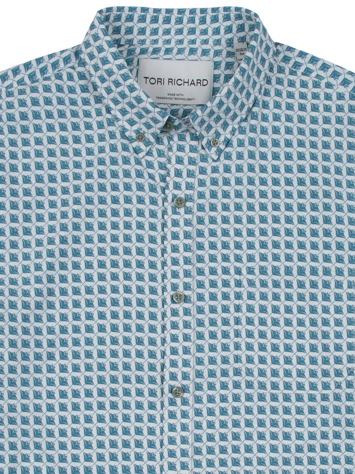 Blue and white colorblock long-sleeve shirt with moisture-wicking Tradewind Technology, front and back views.