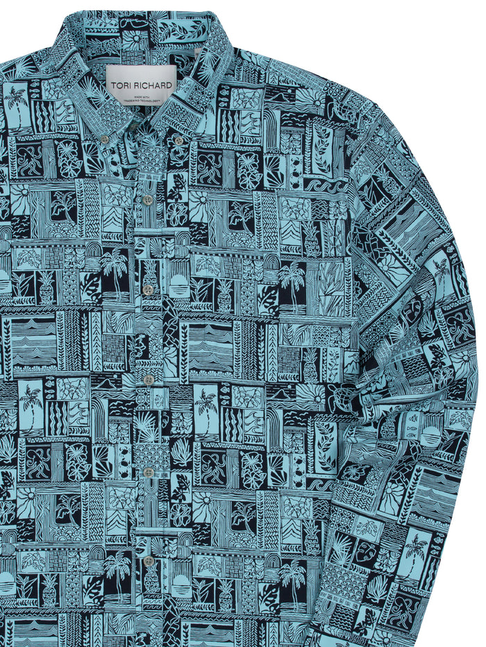 Front and back views: Navy Blue comic-art print moisture-wicking long-sleeve shirt geometric and tropical print long-sleeve collared shirt.