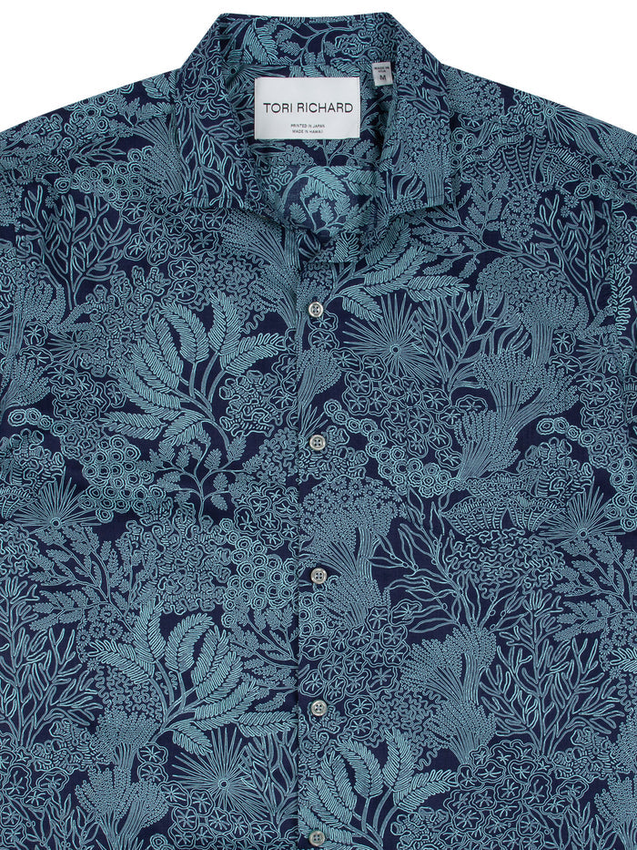 Navy shirt with light blue coral and seaweed print in cotton lawn fabric, front view.