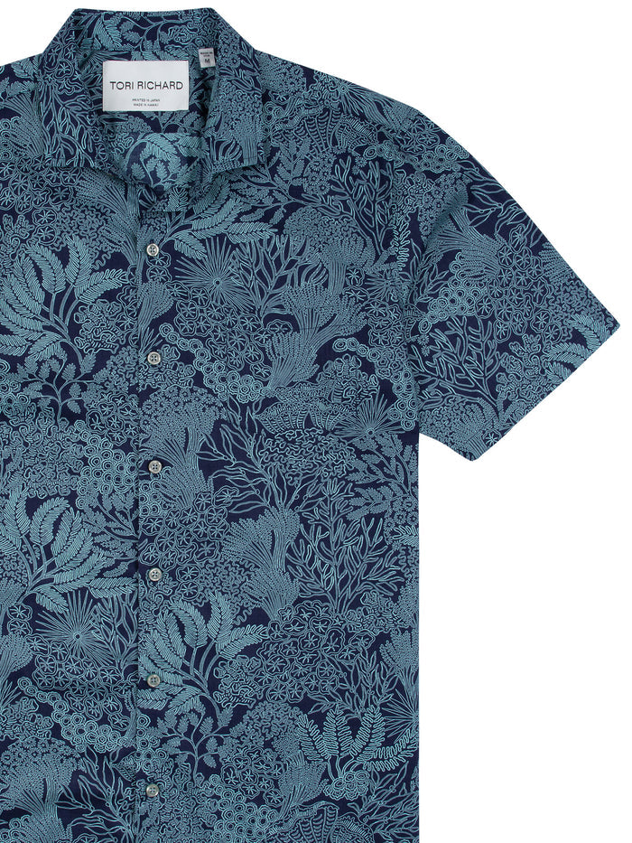 Navy shirt with light blue coral pattern, cotton lawn, button front, shown from front in both images.