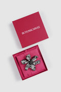 crystal orchid brooch in hematite by buttonscarves