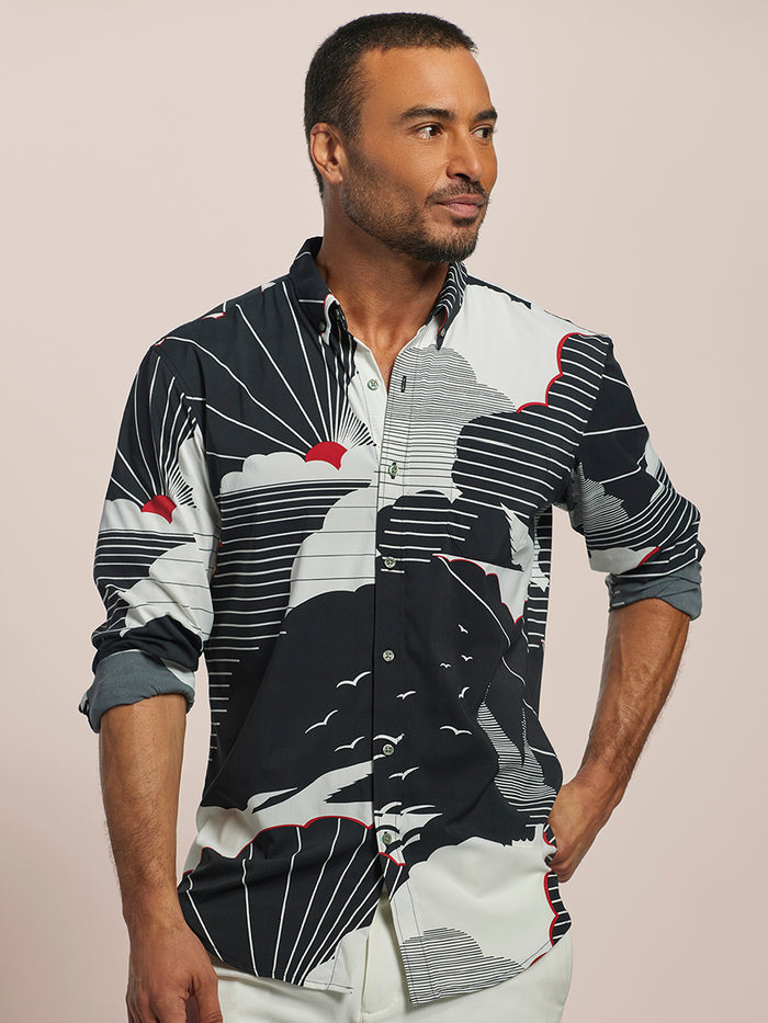 Black and white patterned long-sleeve button-up shirt with red accents, front view.