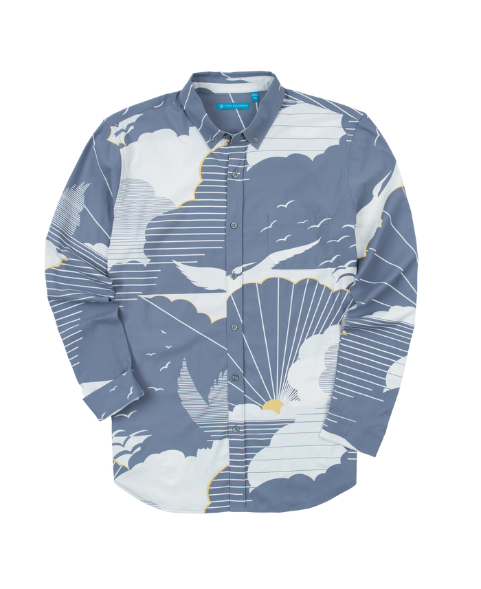 Grey shirt with cloud, bird, and sunray print on long sleeves, front view. #hide