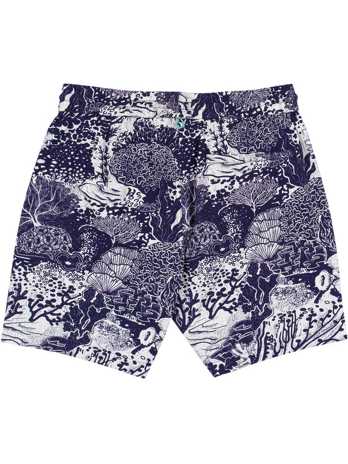 Navy/white coral reef-print swim shorts with UPF sun protection, front and back views.