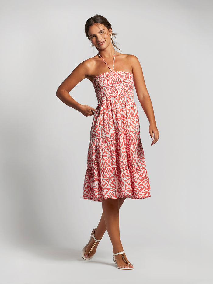 Red solid convertible maxi skirt, front view with sandals, on neutral background.