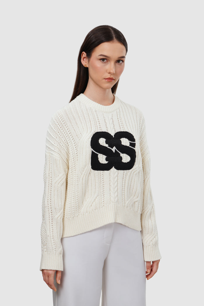 deux knit sweater in ivory by buttonscarves front view