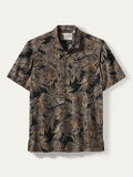 Black and gold-brown tropical leaf print short-sleeve shirt, front and back views.