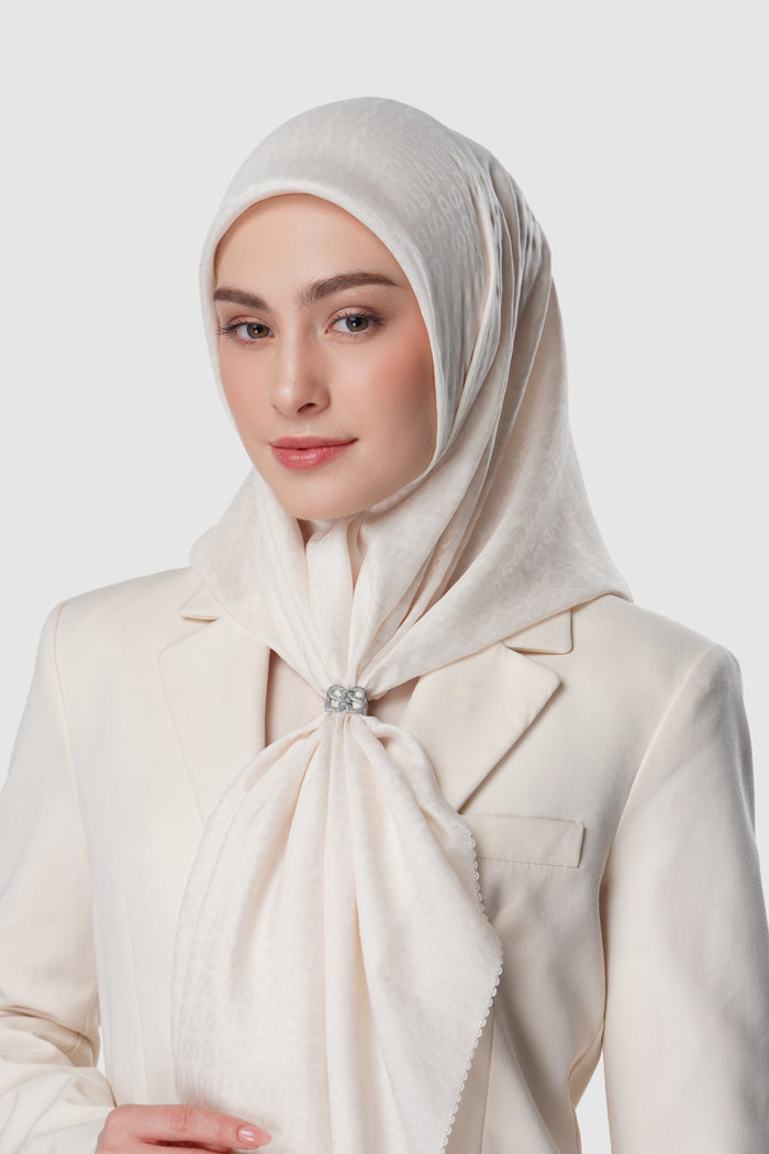 silver brooch by buttonscarves styled on a scarf