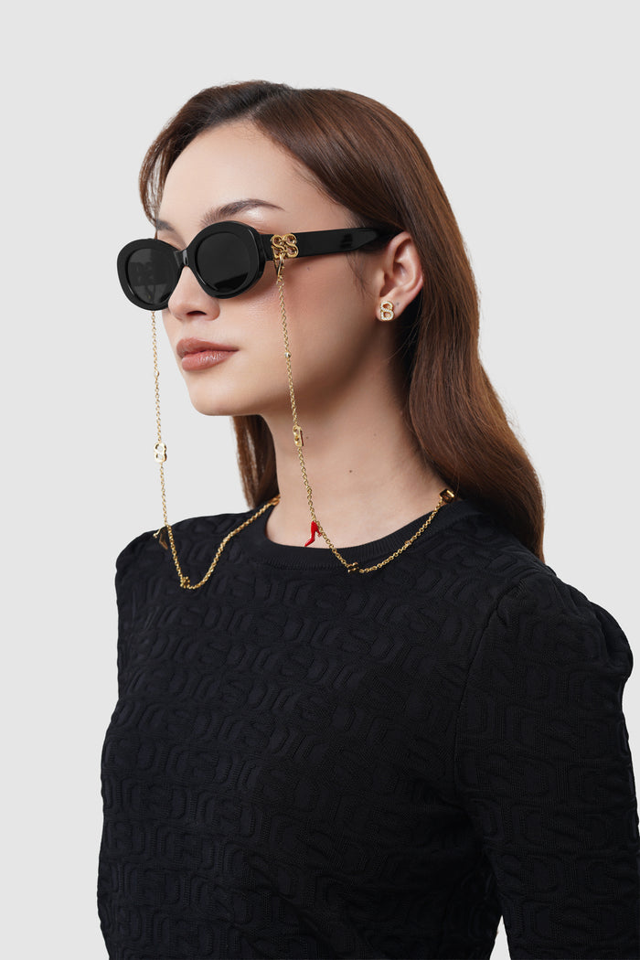 elia sunglasses in black by buttonscarves worn with eyewear chain look