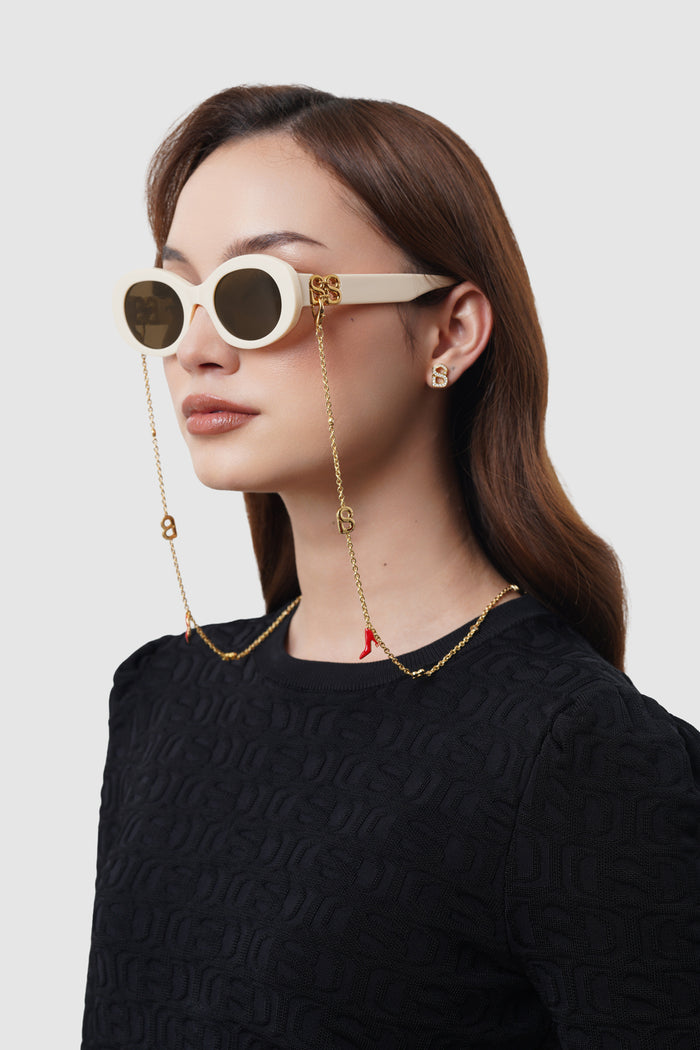 elia sunglasses in broken white by buttonscarves worn with eyewear chain look