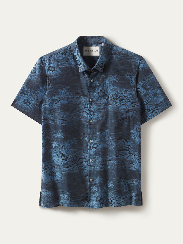 Blue and black palm tree and wave print jacquard shirt, shown in a front view.