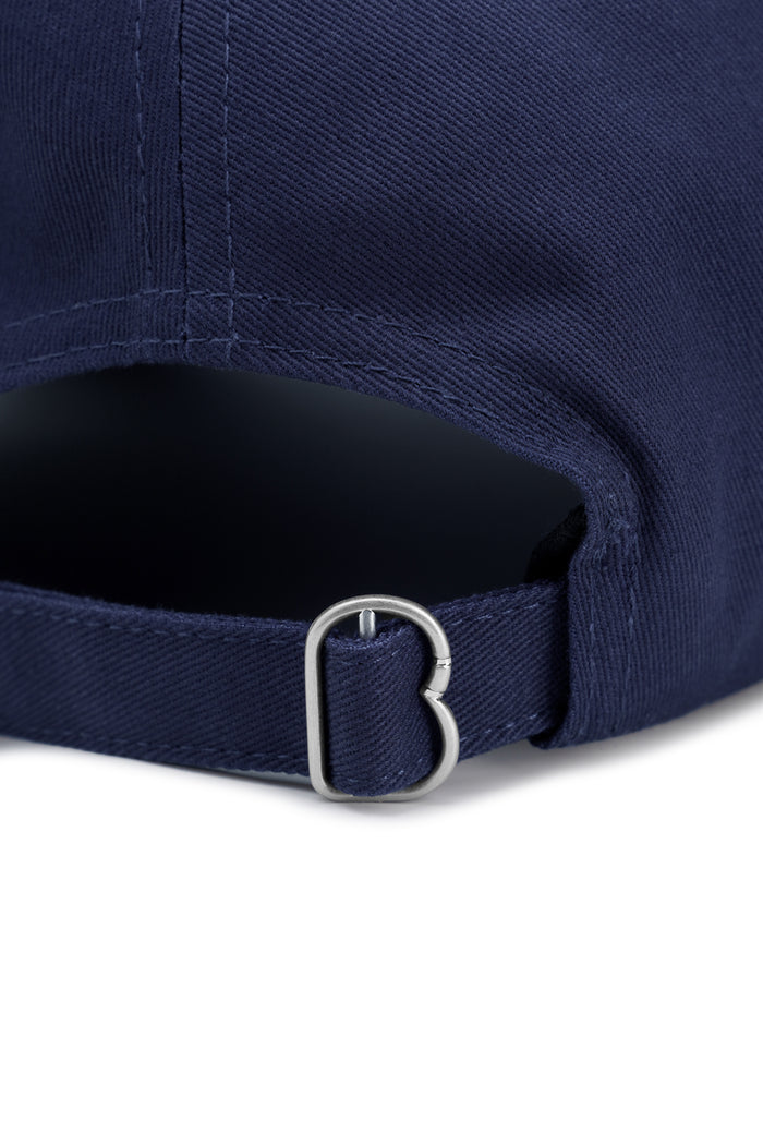 everyday cap in navy by buttonscarves adjustabel strap detail