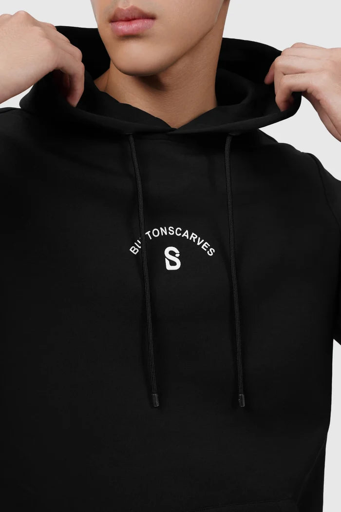everyday signature hoodie in black by buttonscarves with adjustable hood