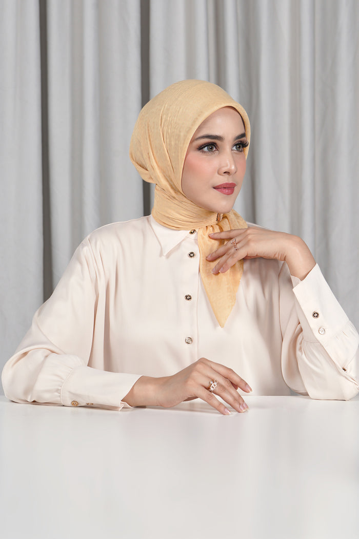 everyday tapis embossed 2.0 scarf in beige by buttonscarves side view
