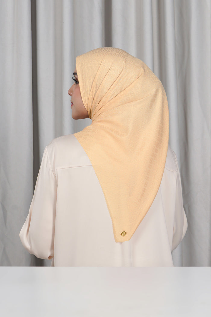 everyday tapis embossed 2.0 scarf in beige by buttonscarves back view