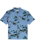 Light blue, short-sleeve shirt with Japanese pine and green foliage print, front view.
