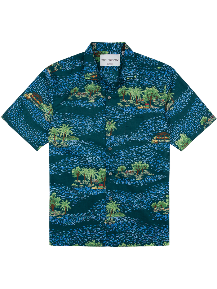 Blue, green, and brown tropical island print short-sleeve shirt, front view.