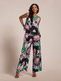 Black, Pink and Green, floral-print Veronica top with matching wide-leg pants, woman front view.