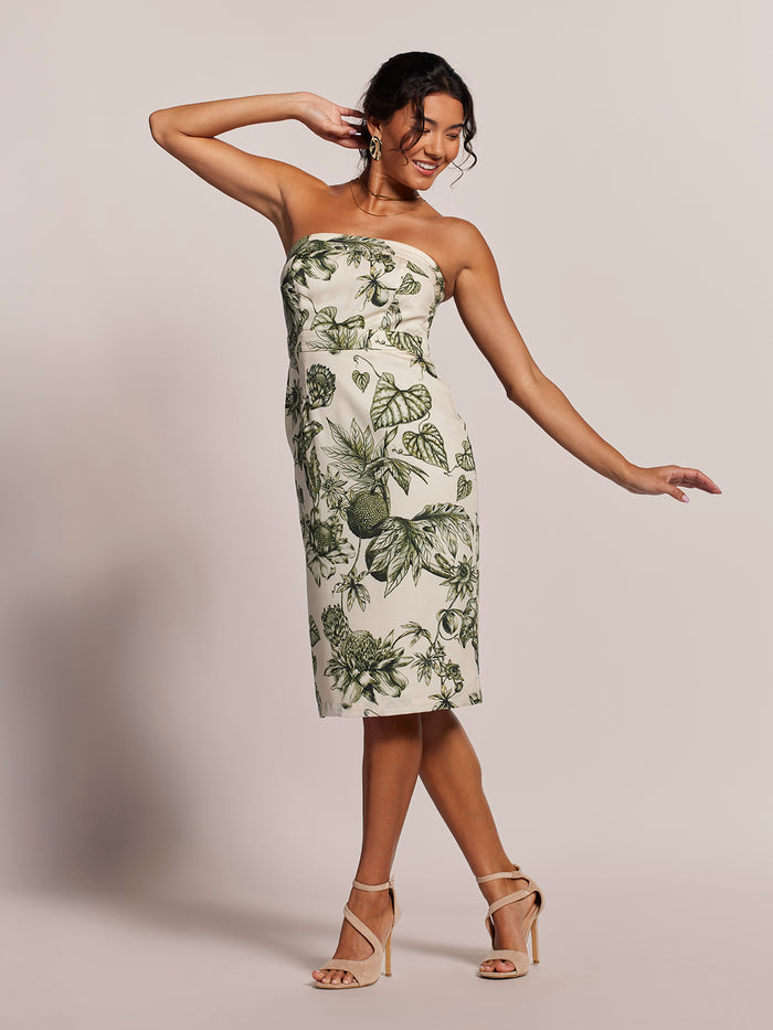 Green leaf-print strapless midi dress, front view on plain background.
