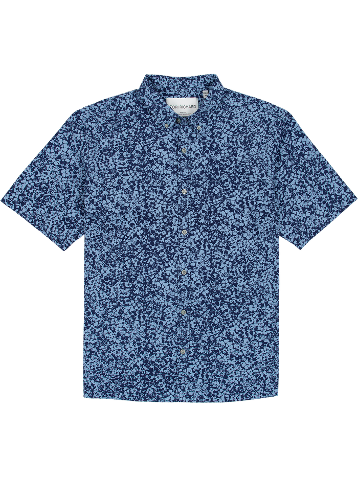 Blue and navy speckled short-sleeve moisture-wicking shirt, flat lay on white background.