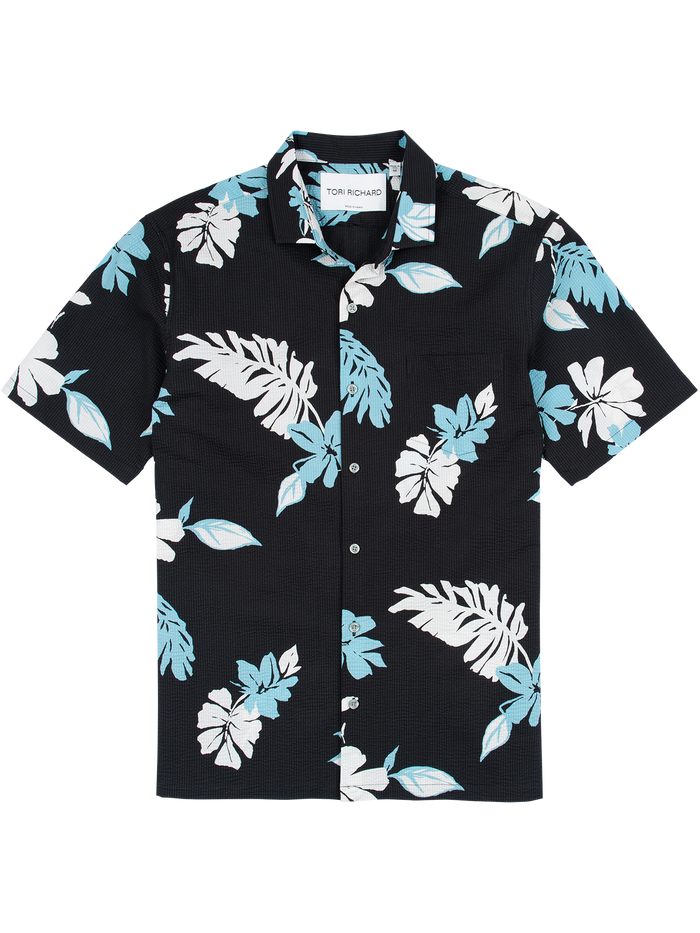 Black shirt, white/blue tropical print, short sleeves, front view, button-down, angle.