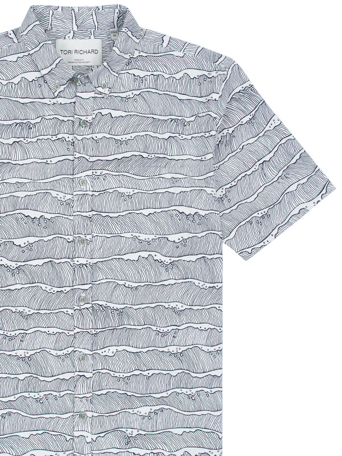 White short-sleeve shirt with black wave print/pattern, front view, moisture-wicking, quick-dry fabric.